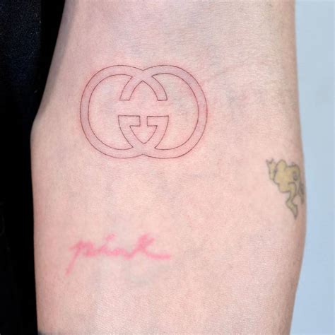 gucci no face tattoo|house of Gucci tattoo cover up.